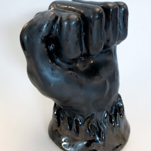 Rachel Parry, grade 11, "Flaming Fist of Anger," ceramics, 7x4x5 in. The process of creating a ceramic sculpture can be tricky. Not only does the artist have to have strong technical knowledge to make a sculpture look appealing and physically balanced, but much is left up to chance during the firing and glazing process. During this process, pieces can crack or explode and glaze can run, flake off, or come out differently than expected. In this sculpture, everything went according to plan. This piece is a physical interpretation of the way anger feels. In this sculpture, Rachel represents anger as a fist surrounded by flames of rage.