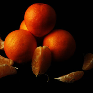 Colin Kay, grade 10, "Simple Still Life," digital photo, 8x10 in. Photo I artists examine Northern Renaissance still life paintings to understand how lighting and careful placement of subject matter can create drama and beauty in a simple still life. In this photo, Colin has demonstrated his understanding of studio lighting and DSLR camera use to create this dramatically lit image.